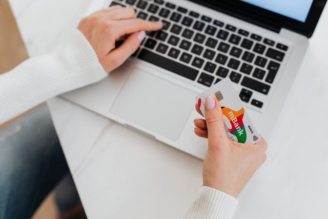 a person preparing to make a rent payment on an online platform